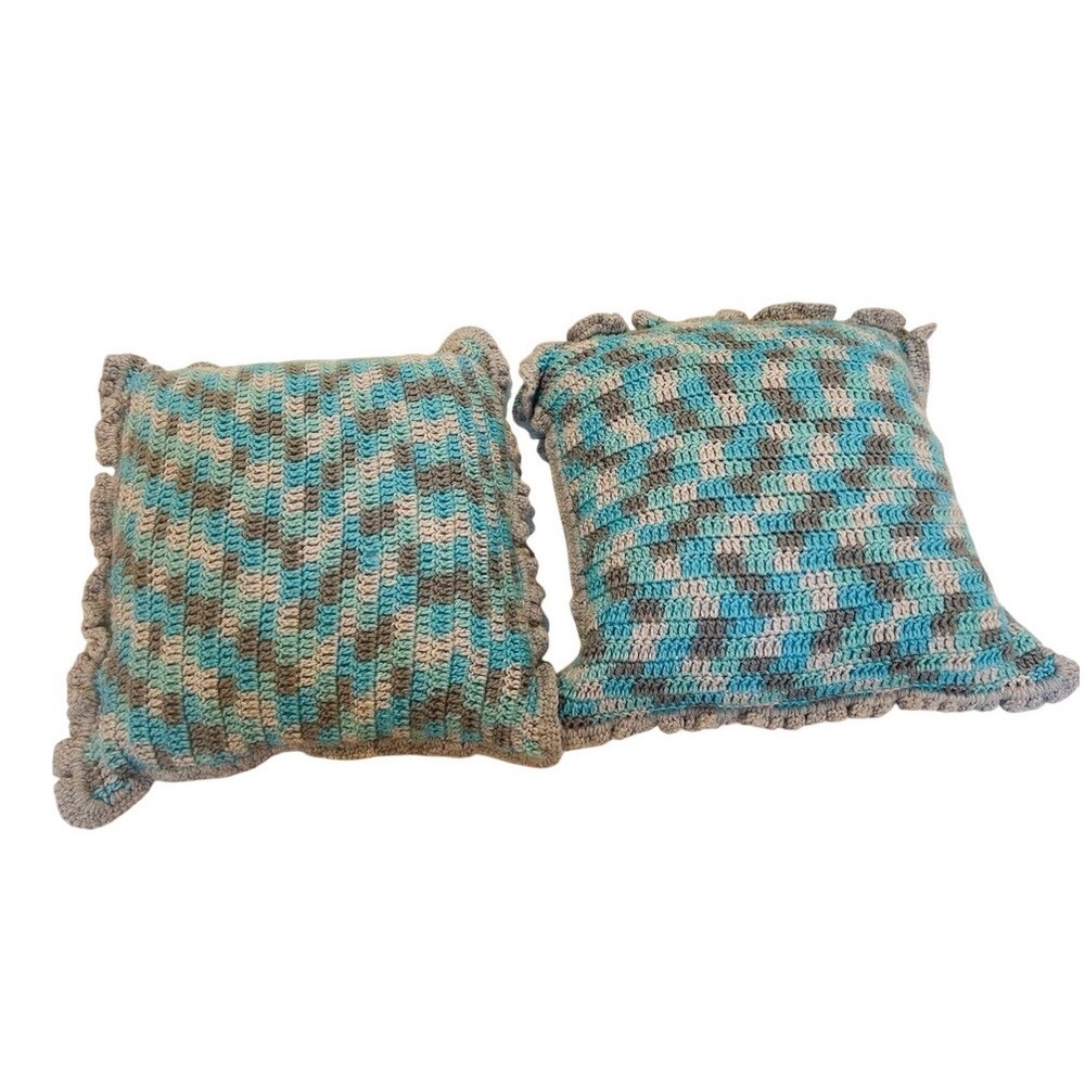 Handmade crocheted rustic farmhouse decorative pillows with ruffled edges.